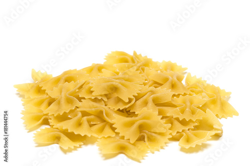 heap of  bow tie pasta isolated on white background