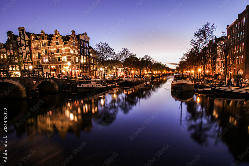 Reflections in the canals of Amsterdam after sunset