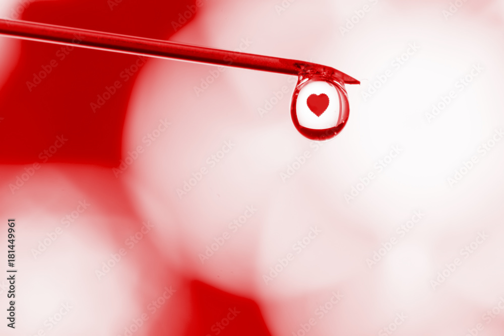 Needle of syringe with a drop and heart inside. Needle of syringe with a drop and heart inside.