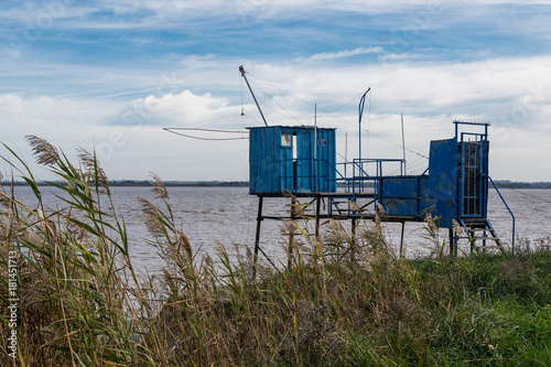 fishing shelter in the harbor of Saint-julien-Beycheville, Gironda river France photo