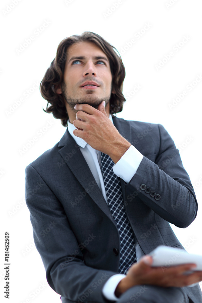 modern businessman with tablet looking at copy space modern businessman with tablet looking at copy space