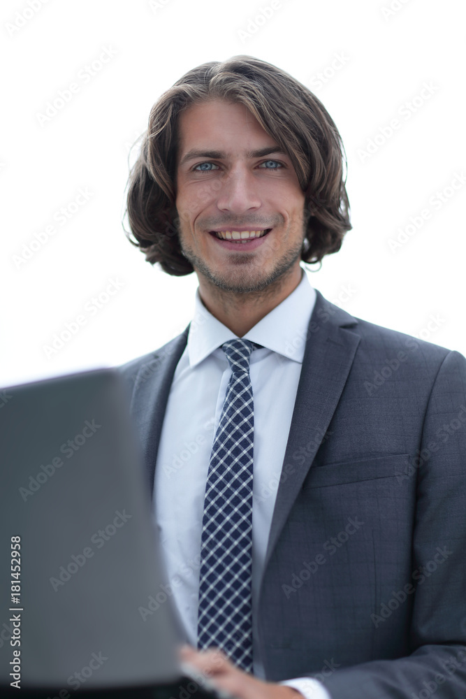 portrait of successful businessman working on laptop portrait of successful businessman working on laptop