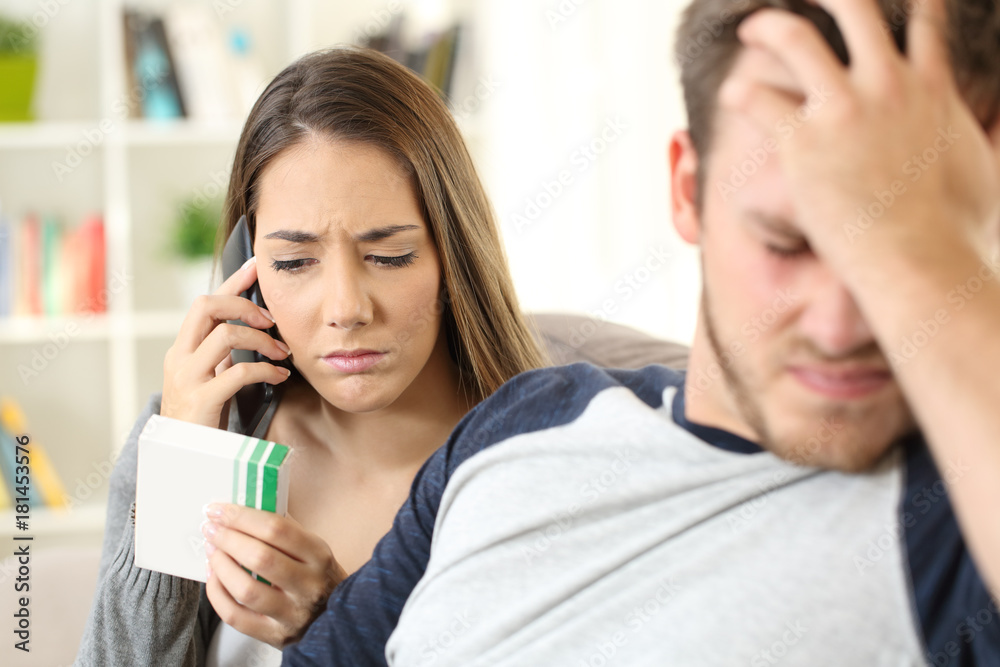 Wife calling doctor to help her ill husband Wife calling doctor to help her ill husband