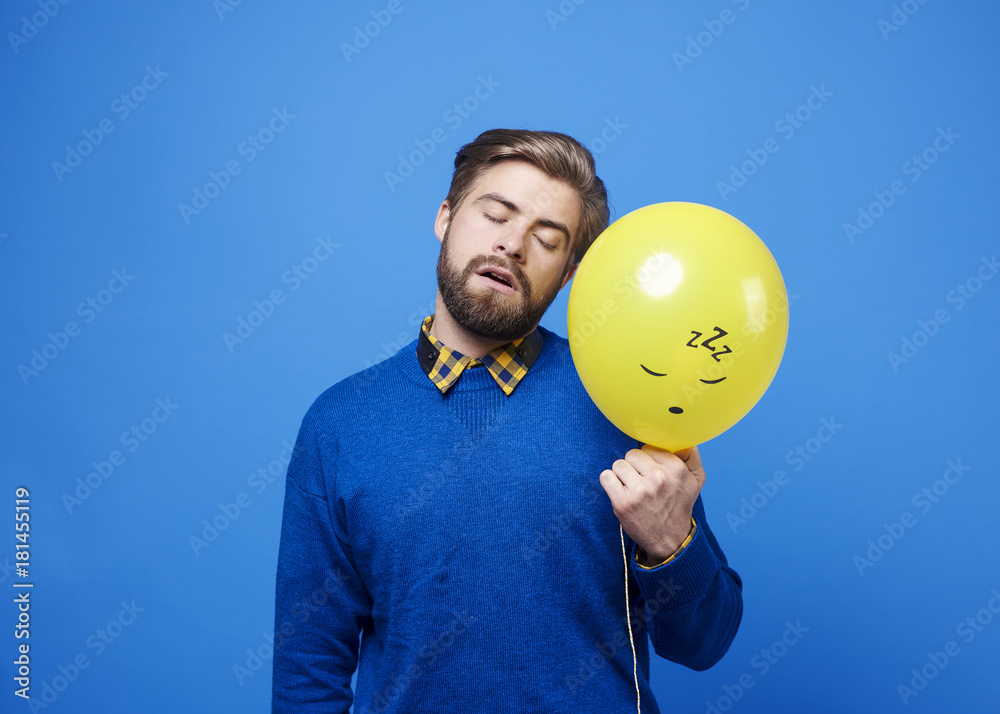 man-sleeping-in-standing-position-stock-photo-adobe-stock