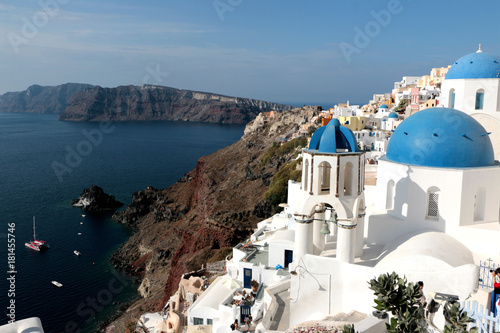 Blurred image of the famous 3 Blue Domes at Santorini photo