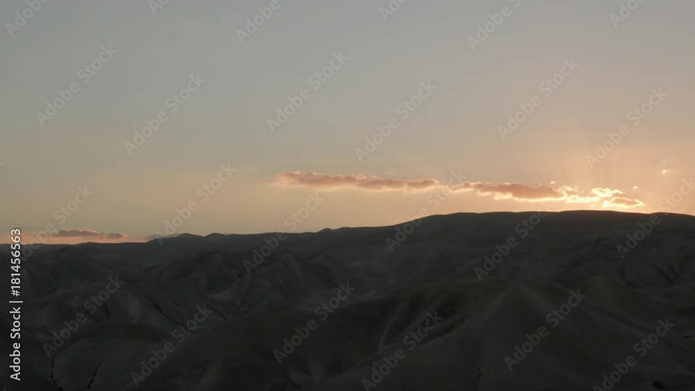 Beautiful sunset over mountains in Judean Desert in Israel, time lapse.