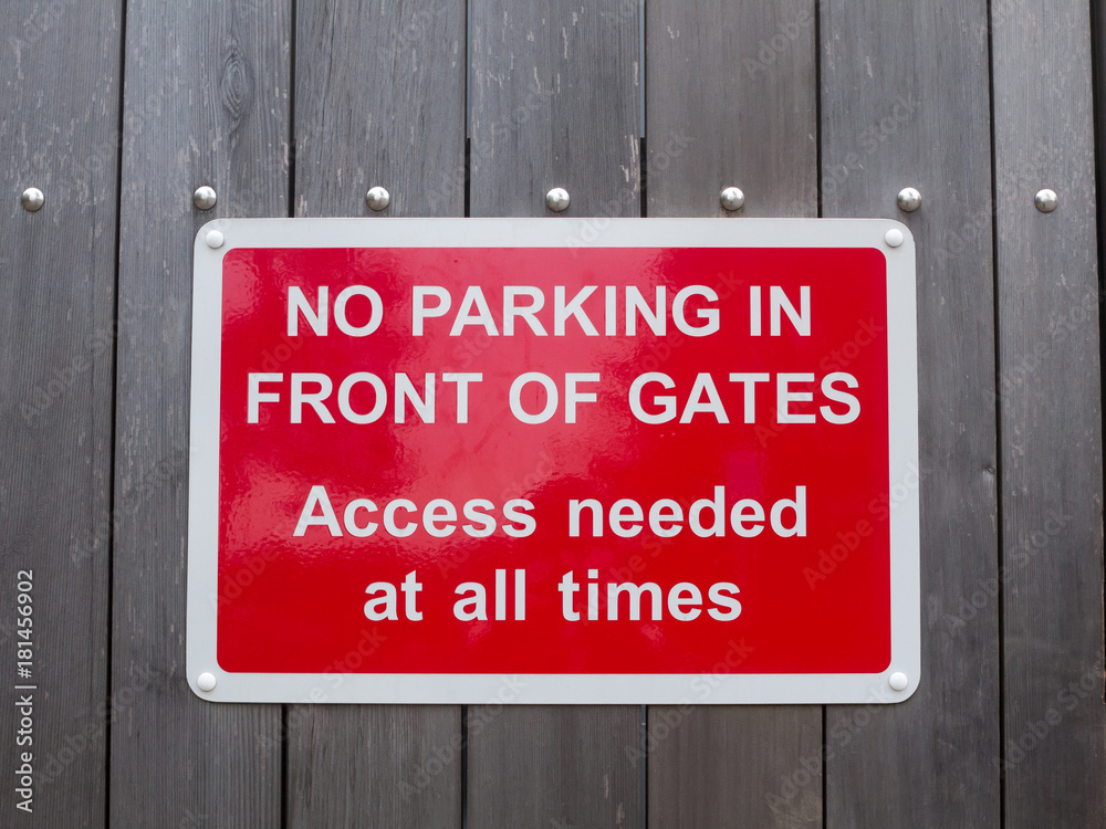 no parking in front of gates access needed at all times red parking sign no parking in front of gates access needed at all times red parking sign