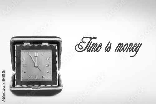 Old red traveling clock, isolated on white. Clock. Antiques. Handmade. Leather watches. Time is money. 11.55 . Eleven fifty-five. Happy New Year. Five minutes to twelve