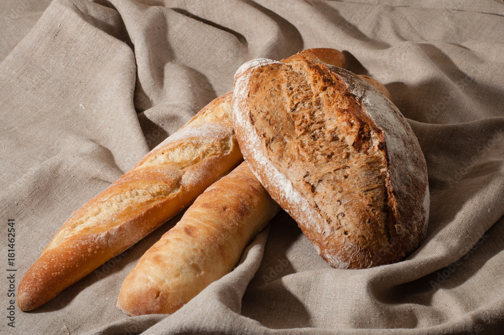 Bread in the background of linen cloth