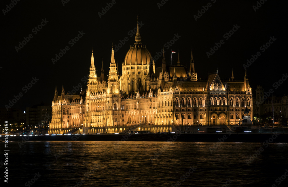 Night view of the Hungarian Parliament in Budapest, Hungary.