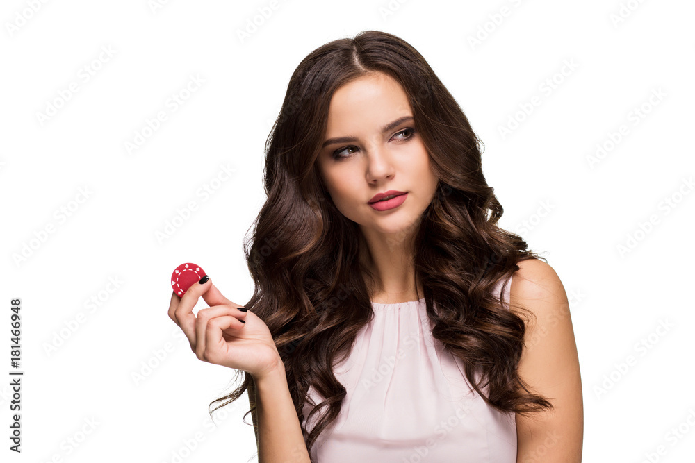 Sexy curly hair brunette posing with chips in her hands, poker concept isolation on white background Sexy curly hair brunette posing with chips in her hands, poker concept isolation on white background