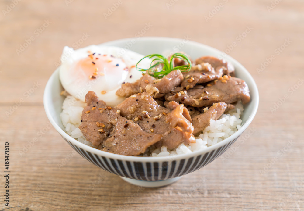 stir-fried pork with garlic on topped rice with egg stir-fried pork with garlic on topped rice with egg