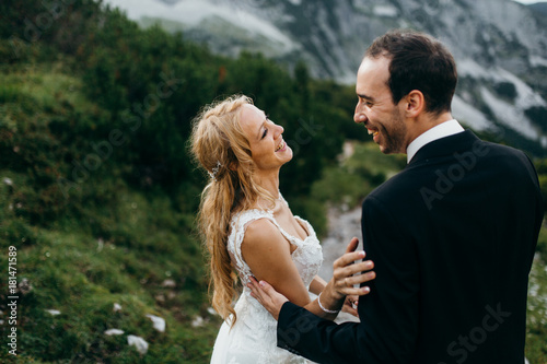 Wonderful shot of wedding couple at mountains 