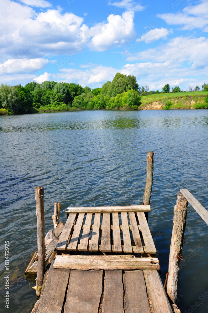 small wooden pier near the river for your design