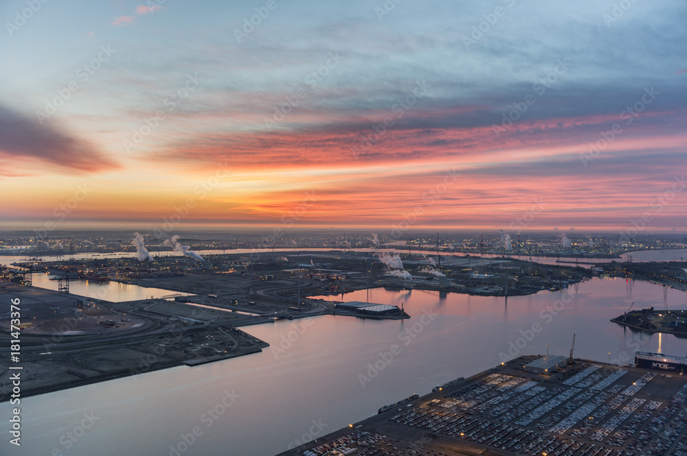 Aerial view on Port of Antwerp before sunrise with Kieldrecht sluis and Ico Terminal in the foreground