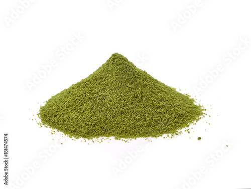 green tea powder heap isolated on white background