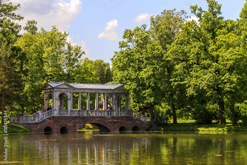 Petersburg, Russia - June 29, 2017: Marble Bridge in the park Tsarskoye Selo, Russia. photo