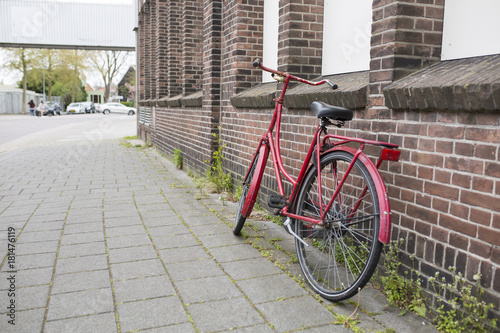 Vintage bike beside the street