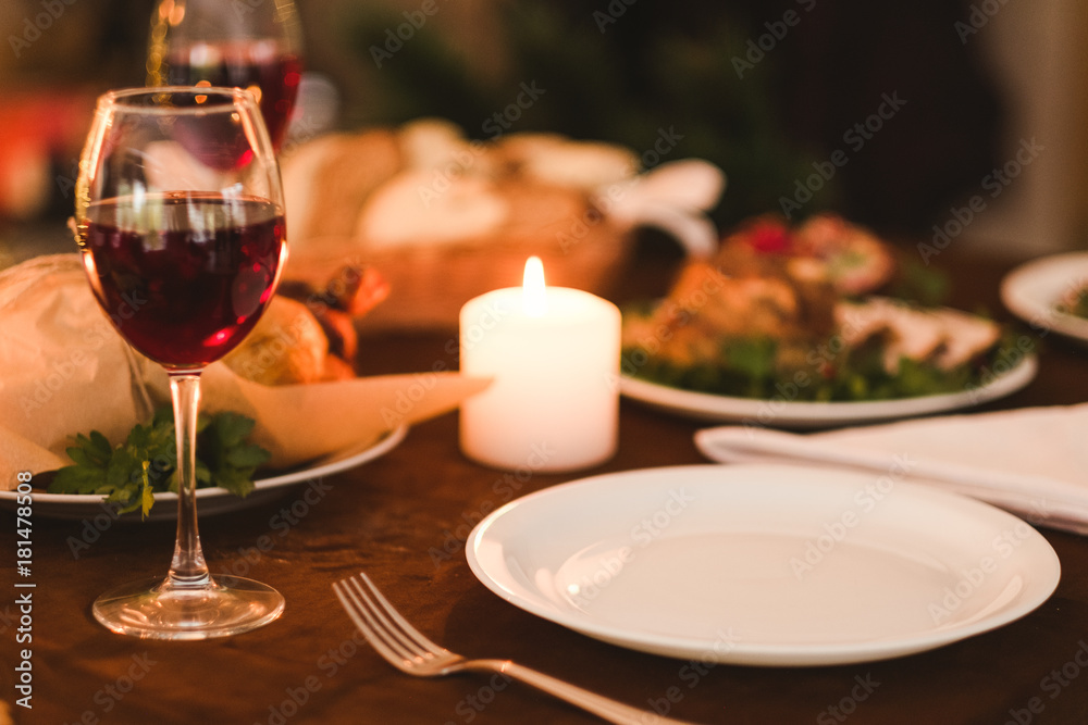 romantic homemade evening family dinner concept. kitchen traditions. delicious holidays food and bright lights. romantic homemade evening family dinner concept. kitchen traditions. delicious holidays food and bright lights.