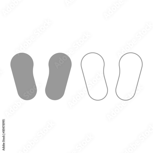 Baby footprint in footwear icon. Grey set .
