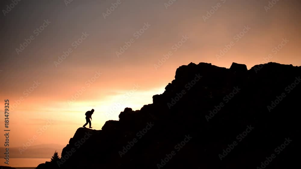 running on the rocks of the energetic mountaineer running on the rocks of the energetic mountaineer