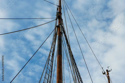 ship's sparrow with wires and ropes under the blue sky
