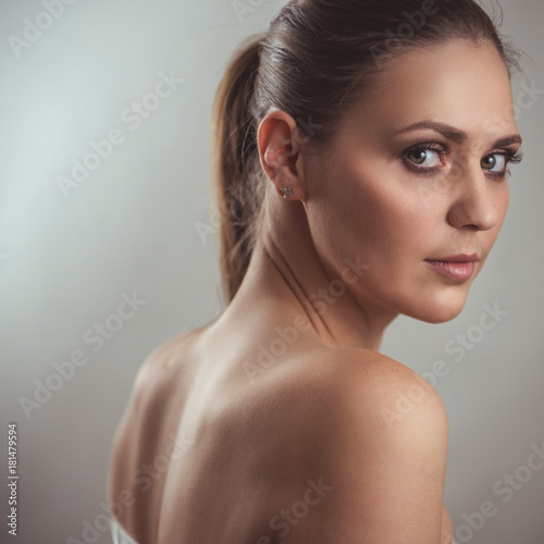 Portrait of a beautiful young woman. Female face close up. Makeup
