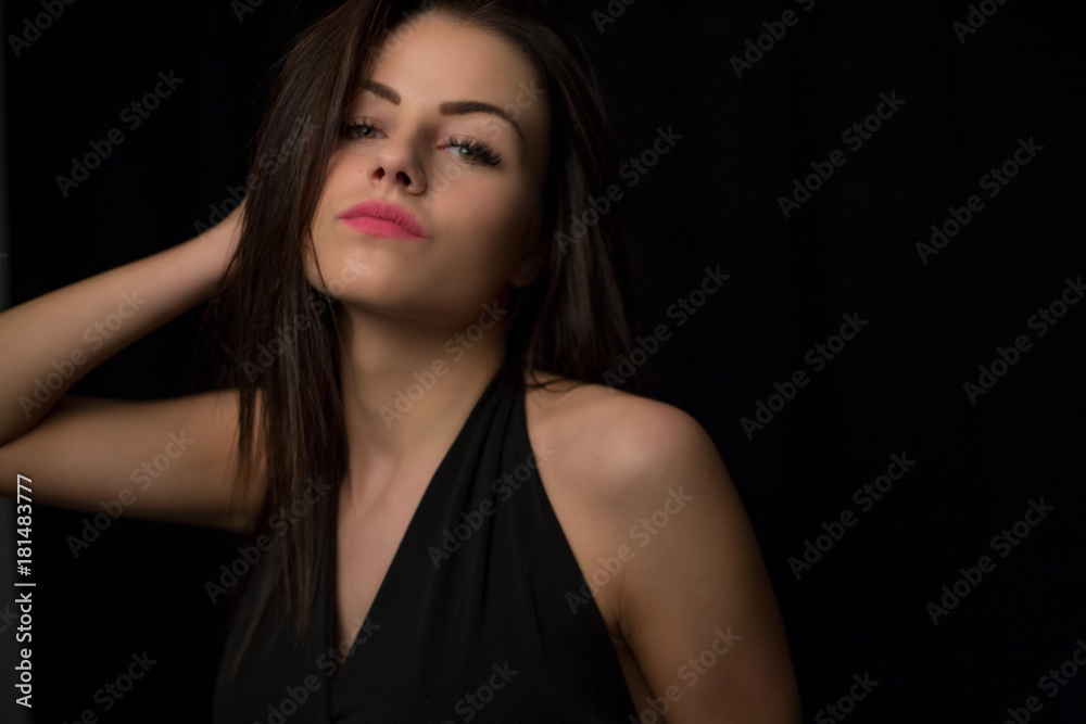 Fashion close up portrait of young sexy beautiful brunette woman with professional makeup.Long hiair and smoky eyes,perfect skin. Fashion close up portrait of young sexy beautiful brunette woman with professional makeup.Long hiair and smoky eyes,perfect skin.