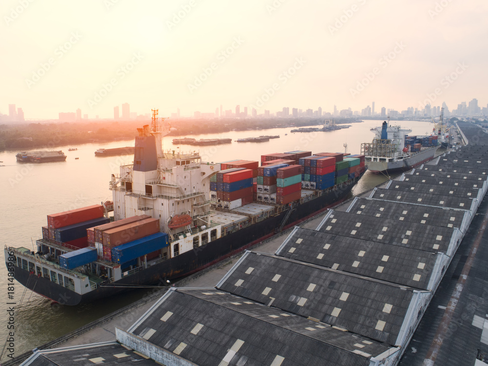 Naklejka premium container,container ship in import export and business logistic,By crane,Trade Port , Shipping,cargo to harbor.Aerial view,Water transport,International,Shell Marine,transportation,logistic,trade,port