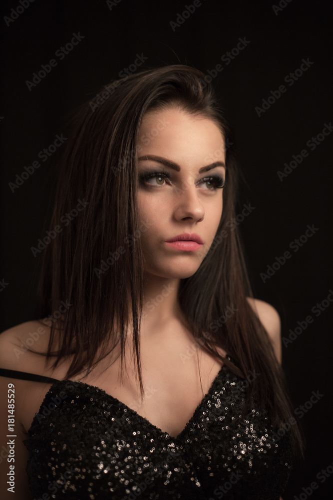 Fashion close up portrait of young sexy beautiful brunette woman with professional makeup.Long hiair and smoky eyes,perfect skin.