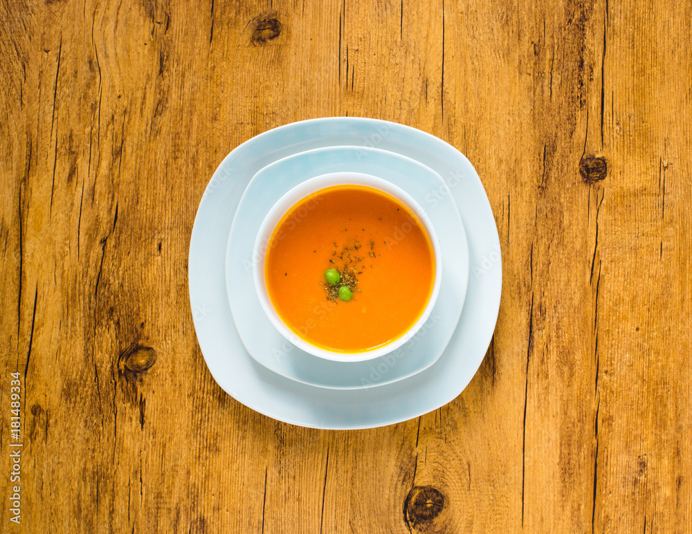 Homemade Pumpkin Soup on rustic wooden background, free space for text. Homemade Pumpkin Soup on rustic wooden background, free space for text.