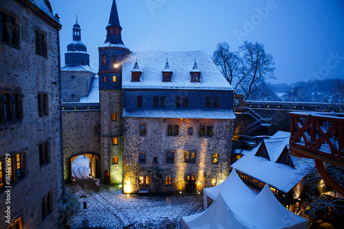German fairytale castle in winter landscape. Castle Romrod in Hessen, Germany photo