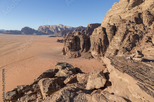 Reddish sand and rock landscapes in the desert of Wadi Rum, southern Jordan