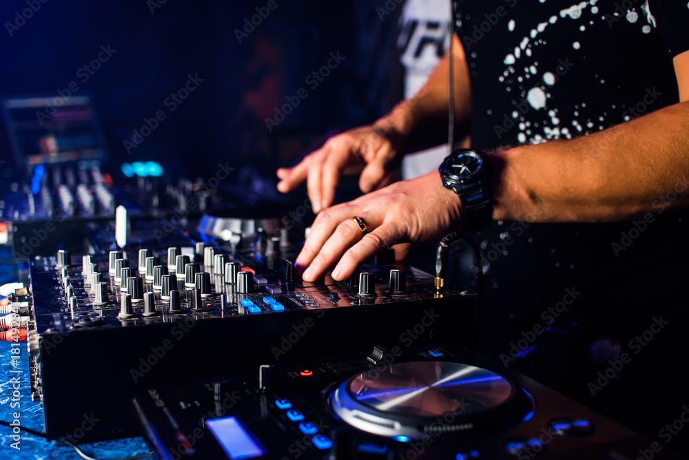 DJ mix music in a professional music boards and equipment DJ mix music in a professional music boards and equipment