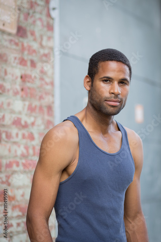 Wallpaper Mural Young handsome African American man in tank top in the rough neighborhood Torontodigital.ca