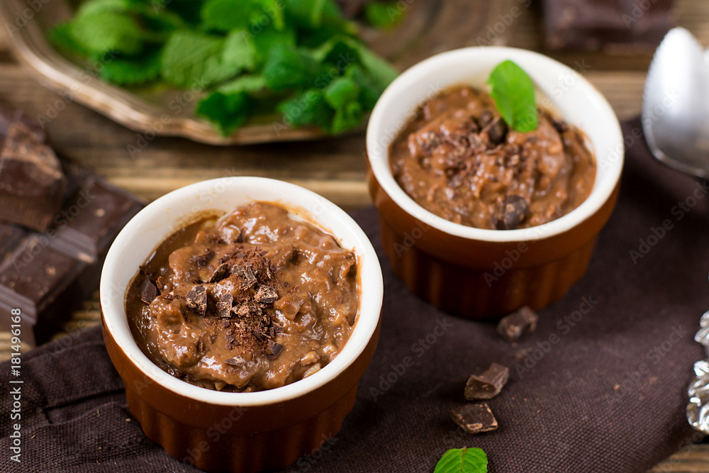 Chocolate custard cream dessert Vla served with mint leaves Chocolate custard cream dessert Vla served with mint leaves