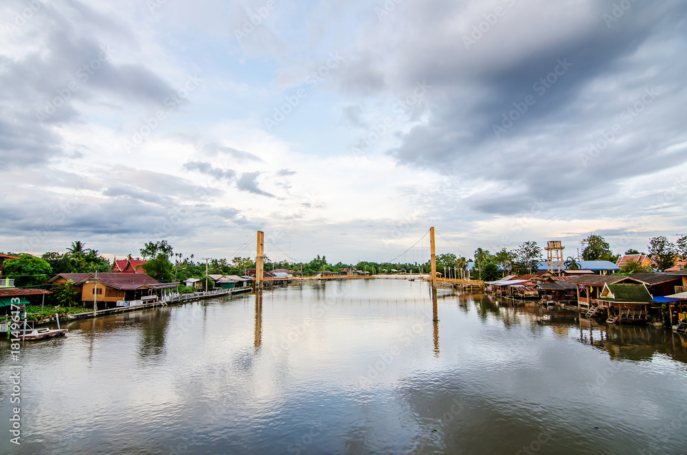 the favourite floating market in Samut Songkram Provine thailand, with golden sunshine in evening