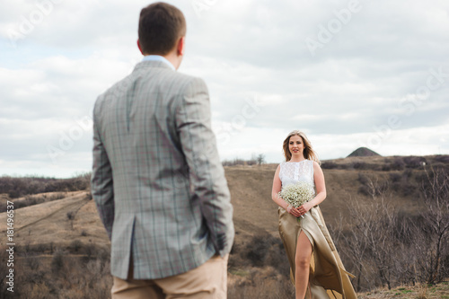 love  romance and people concept - walk the beautiful wedding couple