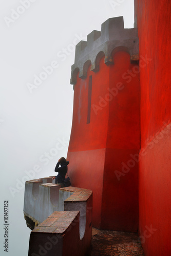 Fotografie Pena Palace , romanticist castle in a foggy autumn day at Sintra , Portugal