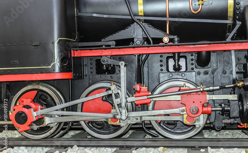 Locomotive wheels are close-up. photo