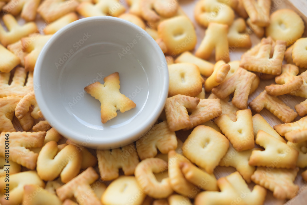 Alphabet biscuit in ceramic cups letters X Alphabet biscuit in ceramic cups letters X