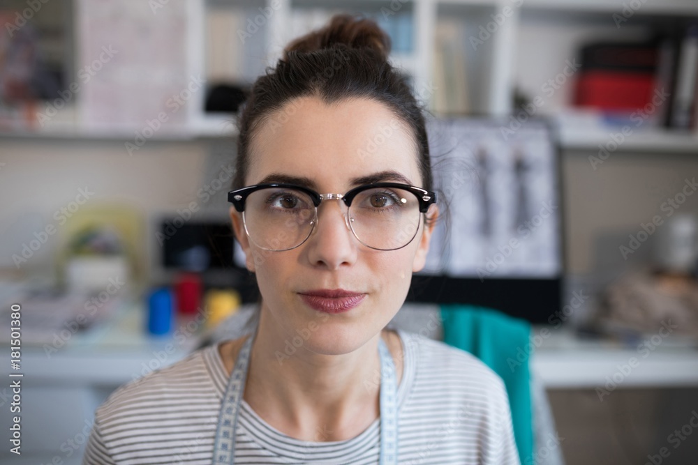 Female designer wearing spectacles Female designer wearing spectacles