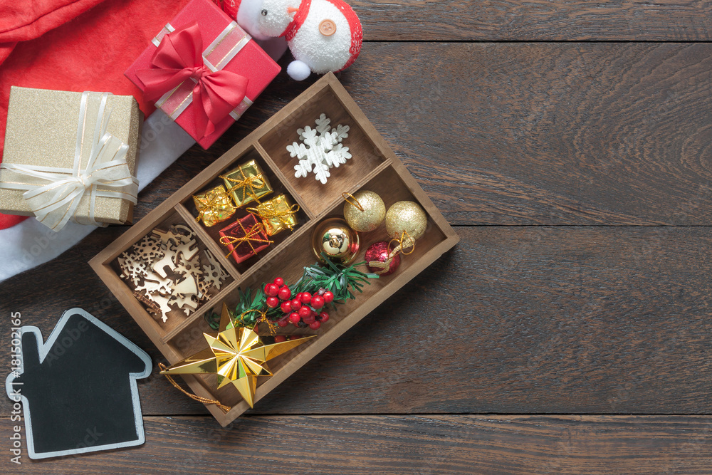 Flat lay aerial image of accessories Merry Christmas & Happy new year festival background concept. Variety beautiful decoration for the winter season on vintage grunge wooden at home office desk. Flat lay aerial image of accessories Merry Christmas & Happy new year festival background concept. Variety beautiful decoration for the winter season on vintage grunge wooden at home office desk.