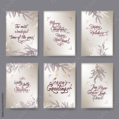 Set of 6 A4 format Christmas greeting cards with mistletoe, pine branches and brush lettering on silver background.