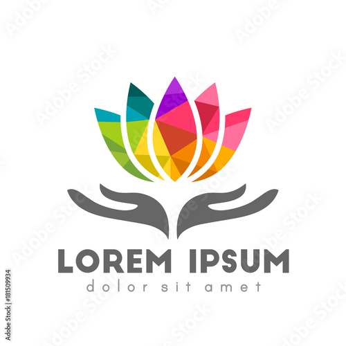 Hand holding colorful abstract lotus flower made in low poly design. Beauty and spa or meditation and yoga logo concept.