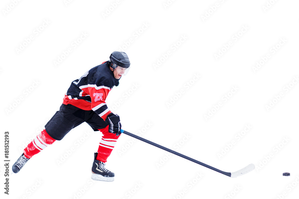 Fototapeta premium Ice hockey skater in attack isolated on white background