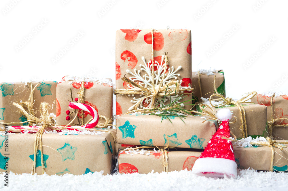 Bunch of Christmas presents and Santa hat Bunch of Christmas presents and Santa hat