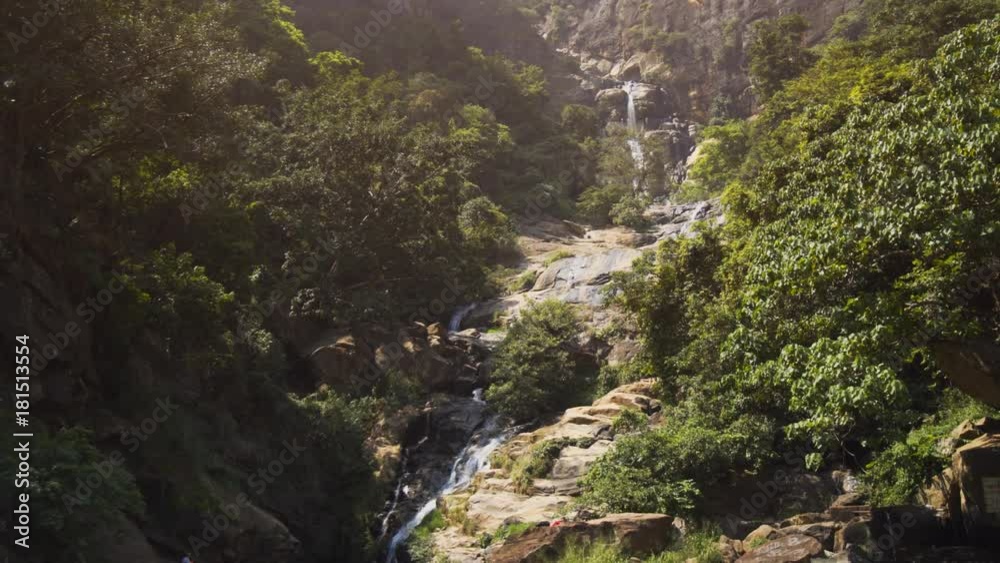 Water of Ravana Falls, Sri Lanka, Tumbling down its Rocky Course Water of Ravana Falls, Sri Lanka, Tumbling down its Rocky Course