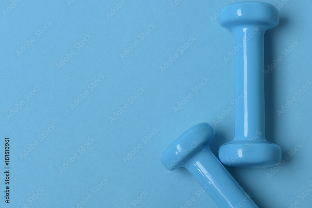 Barbells in small size, topview and copy space. Healthy lifestyle
