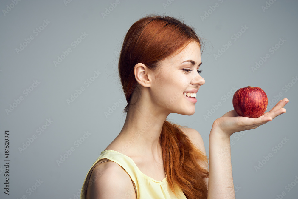 Diet, fruit, food, apple, girl on a gray background, diet, healthy diet, health, beauty Diet, fruit, food, apple, girl on a gray background, diet, healthy diet, health, beauty